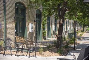 Minneapolis apartment for rent - Outdoor Patio with Tables and Chairs at FreightYard Townhomes and Flats, Minnesota, 55401