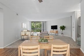 St. Charles apartment for rent - A dining room with a wooden table and chairs.