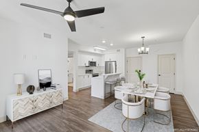 Goleta apartment for rent - A modern dining room with a white table and chairs.