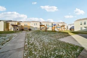 Palmer apartment for rent - A residential area with houses and a playground.
