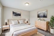 Sugar Hill apartment for rent - A bedroom with a bed, nightstands, and a dresser.