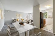 Dumfries apartment for rent - A modern dining room with a marble table and chairs.
