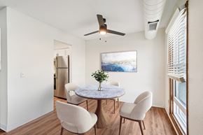 Wayzata apartment for rent - A dining room with a table and chairs.