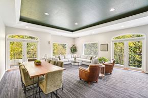 Beaverton apartment for rent - A sitting room with a wooden table and chairs.