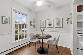 Ellington apartment for rent - A dining room with a table and chairs.
