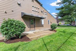 Gresham apartment for rent - A building with a green lawn in front of it.