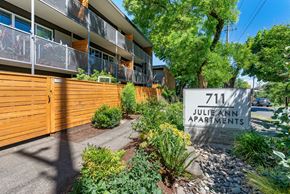 Portland apartment for rent - A sign for Julie Ann Apartments is in front of a building.