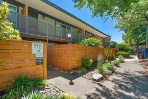 Portland apartment for rent - A residential building with a sign that reads