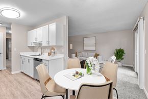 Beaverton apartment for rent - A dining room with a table set for two.