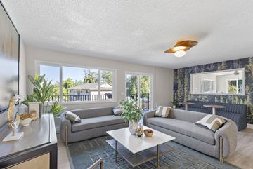 Portland apartment for rent - A living room with two grey couches and a coffee table.