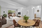 Gresham apartment for rent - A living room with a brown table and chairs.