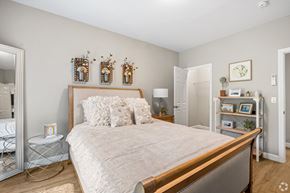 Stratford apartment for rent - a bedroom with a large bed and a mirror at Lofts at 335, Stratford, Connecticut