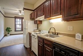Portland apartment for rent - a kitchen with a sink and a refrigerator at Whitney Gray, Oregon, 97205?