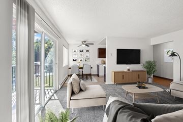 Portland apartment for rent - A modern living room with a grey sofa and a wooden coffee table.