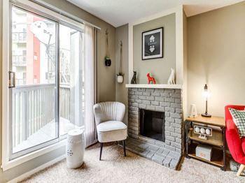 Wood burning fireplace in select units
