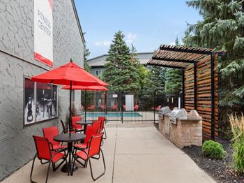 Poolside picnic area with bbq grills