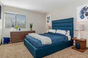 Madison apartment for rent - Bedroom with a bed and a dresser at Renew Madison, Madison