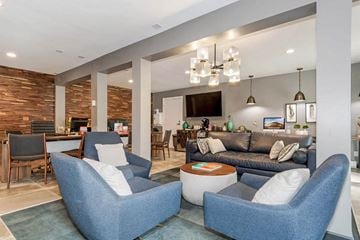 Madison apartment for rent - a living room filled with furniture and a flat screen tv at Renew Madison, Wisconsin, 53711