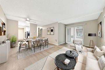 Tualatin apartment for rent - A living room with a dining table and chairs.