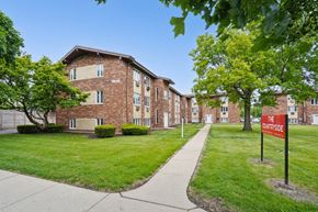 Countryside apartment for rent - A brick building with a sign
