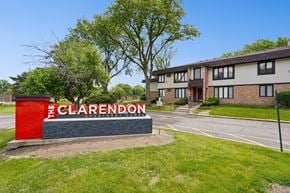 Clarendon Hills apartment for rent - The Clarendon sign is in front of a building.