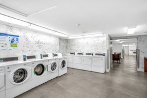 North Vancouver apartment for rent - A row of washing machines in a laundromat.