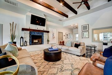 San Antonio apartment for rent - a living room with couches and a fireplace