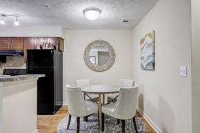 Atlanta apartment for rent - A kitchen with a table and chairs.