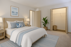 Duluth apartment for rent - Townhomes for Rent in Duluth, GA - Amberlake Village - Bedroom With Neutral Bedding, Light Wood Furniture, Soft Blue Accents, Open Closet, And Wall Art Above Bed.