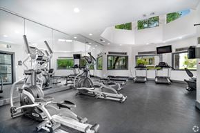 San Antonio townhouse for rent - A gym with a row of exercise bikes.