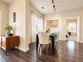 San Antonio apartment for rent - A dining room with a wooden table and chairs.