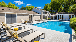 Duluth apartment for rent - Duluth, GA, Apartments with In-Unit Washer and Dryer - The Eclipse - Swimming Pool With Lounge Chairs, Spacious Sundeck, Landscaped Surroundings, And Apartment Building.