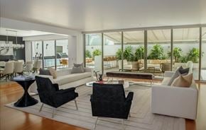 Raleigh apartment for rent - A modern living room with black and white furniture.