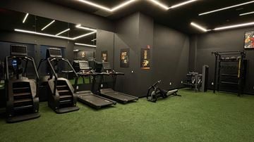 Newark apartment for rent - A gym with treadmills, exercise bikes, and other equipment.