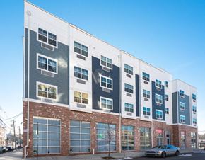 Newark apartment for rent - a building with a car parked in front of it