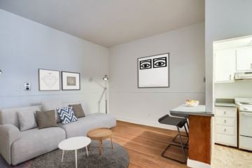 Baltimore apartment for rent - a living room with a couch and a table