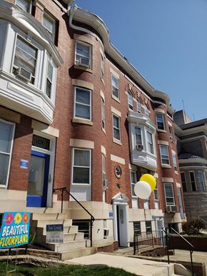 Baltimore apartment for rent - a brick building with a balloon in front of it