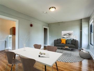 Baltimore apartment for rent - a living room with a table and a couch