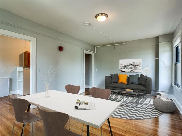Baltimore apartment for rent - a living room with a table and a couch