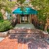 Baltimore apartment for rent - a house with a blue awning on the front of it