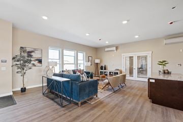 Airway Heights apartment for rent - a living room with a couch and chairs and a table