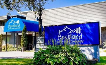 Coeur D'alene apartment for rent - a building with a blue sign on the side of it