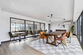Post Falls apartment for rent - A modern dining room with a large table and chairs.