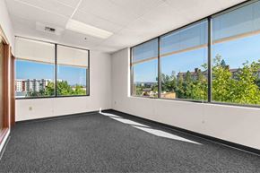 Spokane apartment for rent - A room with large windows and a view of the city.