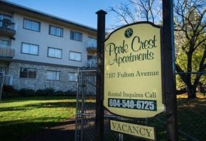 Burnaby apartment for rent - a sign that is in front of a building