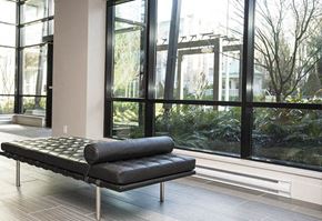 Port Coquitlam apartment for rent - a black chaise lounge in front of a large window