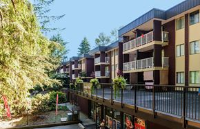 Burnaby apartment for rent - an apartment complex with balconies and trees