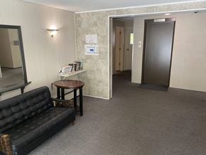 Burnaby apartment for rent - a small room with a couch and a small table