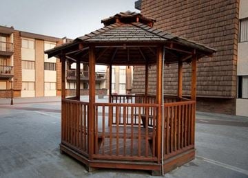 Coquitlam apartment for rent - A gazebo is in the middle of a courtyard.