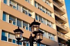 New Westminster apartment for rent - Two black street lamps are mounted on a pole.